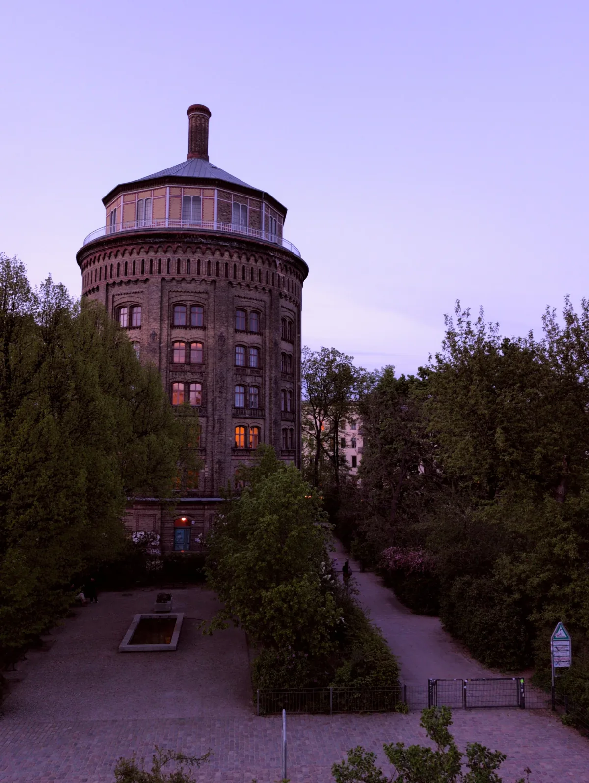 A Berlin water tower at dusk photographed with the Golden Hour film look, captured in-camera with Lvma